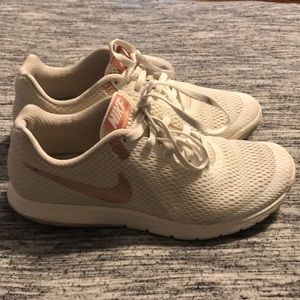 White and rose gold Nike’s